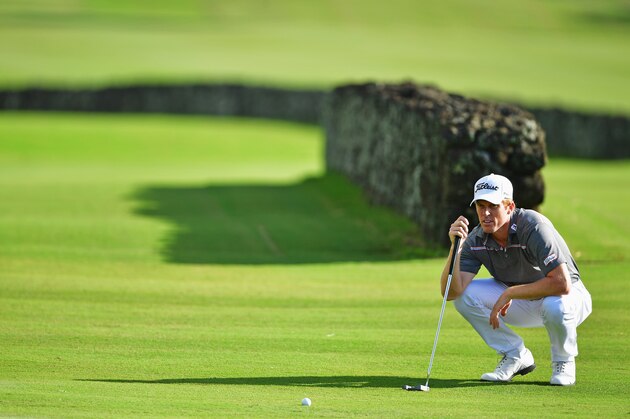 POSTE DE FLACQ, MAURITIUS - MAY 12:  Andrew Dodt of Australia lines up a putt during the first round of AfrAsia Bank Mauritius Open at Four Seasons Golf Club Mauritius at Anahita on May 12, 2016 in Poste de Flacq, Mauritius.  (Photo by Stuart Franklin/Getty Images)