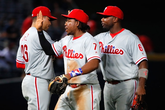 ATLANTA, GA - MAY 10:  Maikel Franco #7, Ryan Howard #6 of the Philadealphia Phillies nd Jeanmar Gomez #46 of the Philadelphia Phillies celebrate their 3-2 win over the Atlanta Braves at Turner Field on May 10, 2016 in Atlanta, Georgia.  (Photo by Kevin C. Cox/Getty Images)