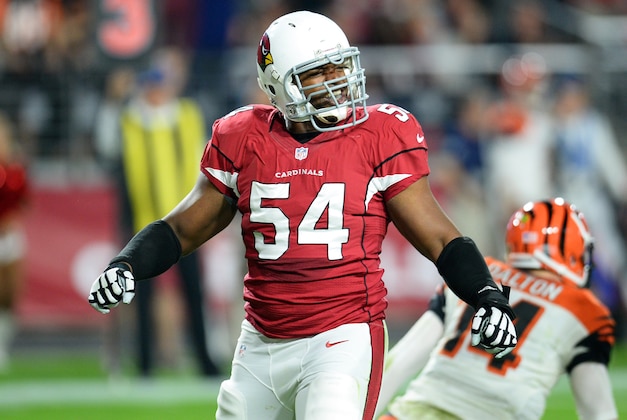Nov 22, 2015; Glendale, AZ, USA; Arizona Cardinals linebacker Dwight Freeney (54) celebrates a sack against Cincinnati Bengals quarterback Andy Dalton (14) at University of Phoenix Stadium. Mandatory Credit: Joe Camporeale-USA TODAY Sports