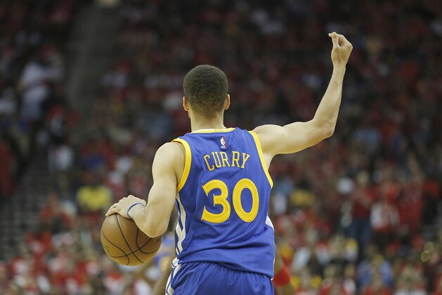Apr 24, 2016; Houston, TX, USA; Golden State Warriors guard Stephen Curry (30) dribbles against the Houston Rockets in the first half in game four of the first round of the NBA Playoffs at Toyota Center. Golden State Warriors won 121 to 94. Mandatory Credit: Thomas B. Shea-USA TODAY Sports