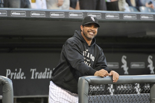 CHICAGO, IL - AUGUST 29:  Manager Ozzie Guillen #13 of the Chicago White Sox stands in the dugout before the game against the Minnesota Twins at U.S. Cellular Field on August 29, 2011 in Chicago, Illinois.  (Photo by Brian Kersey/Getty Images)