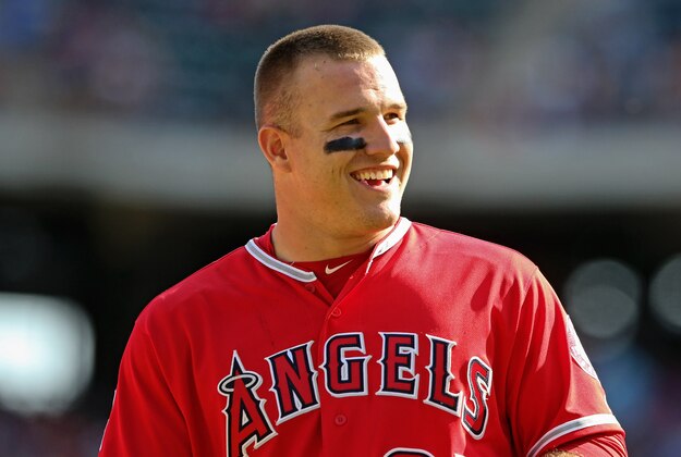 May 1, 2016; Arlington, TX, USA; Los Angeles Angels center fielder Mike Trout (27) laughs during the eighth inning against the Texas Rangers at Globe Life Park in Arlington. Mandatory Credit: Kevin Jairaj-USA TODAY Sports