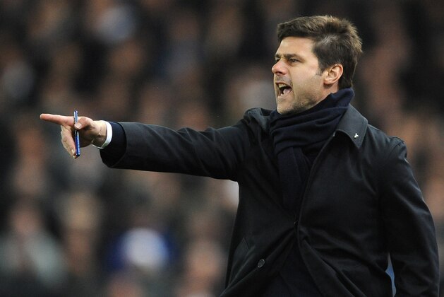 FILE - In this April 18, 2016 file photo, Tottenham's manager Mauricio Pochettino shouts during an English Premier League soccer match against Stoke City in Stoke on Trent, England. Pochettino plans to extend his Tottenham contract until 2021. The Argentine, who arrived at Tottenham on a five-year contract in 2014, announced on Friday, April 29, 2016, he has verbally agreed to a new five-year deal. (AP Photo/Rui Vieira, File)