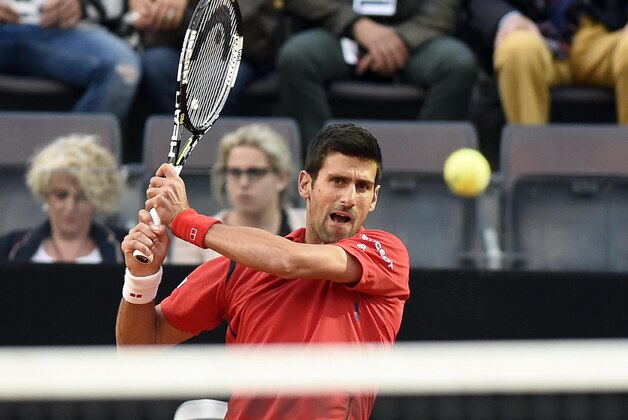 Novak Djokovic, from Serbia, eyes the ball during his match against Thomaz Bellucci of Brazil at the Italian Open tennis tournament, in Rome, Thursday, May 12, 2016. (Claudio Onorati/ANSA via AP Photo)