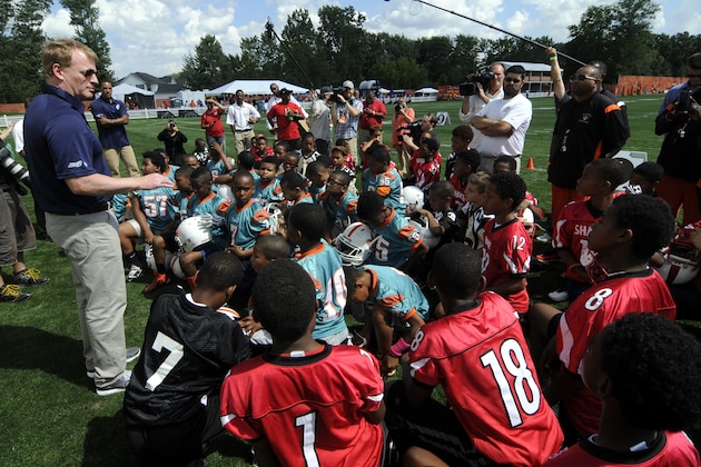 NFL commissioner Roger Goodell is seen at Heads Up Football skills clinic for youth football players from the Northeast Ohio Pop Warner Leagues on Thursday, August 1, 2013 at the Cleveland Browns Training Facility in Berea, Ohio. Heads Up Football is a new, comprehensive youth football membership program developed by USA Football and supported by the NFL to further advance youth player safety. (Tom E. Puskar/ AP Images for NFL Network)