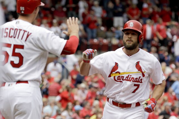 St. Louis Cardinals' Matt Holliday, right, is congratulated by teammate Stephen Piscotty after hitting a two-run home run during the first inning of a baseball game against the Chicago Cubs Wednesday, April 20, 2016, in St. Louis. (AP Photo/Jeff Roberson)