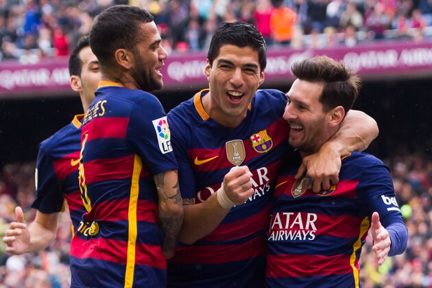 BARCELONA, SPAIN - MAY 08:  (L-R) Sergio Busquets, Dani Alves and Luis Suarez celebrate with their teammate Lionel Messi after scoring the opening goal during the La Liga match between FC Barcelona and RCD Espanyol at Camp Nou on May 8, 2016 in Barcelona, Spain.  (Photo by Alex Caparros/Getty Images)