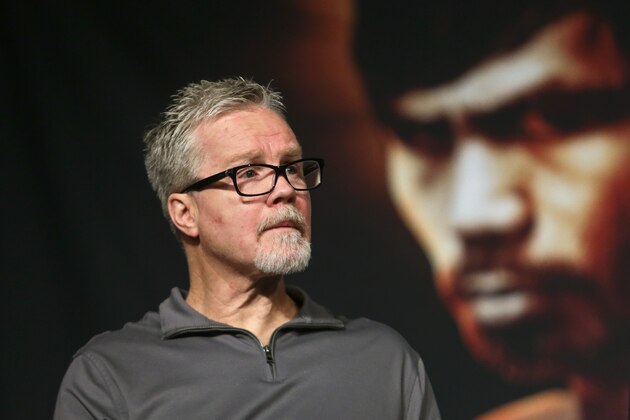 Trainer Freddie Raoch listens to speakers during a news conference to promote an upcoming fight between Manny Pacquiao and Timothy Bradley,  Thursday, Jan. 21, 2016, in New York. (AP Photo/Frank Franklin II)