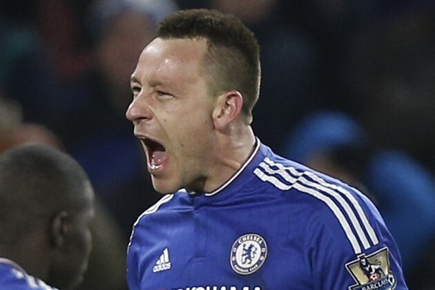 Chelsea's English defender John Terry (C) celebrates scoring a late equalising goal to make the score 3-3 during the English Premier League football match between Chelsea and Everton at Stamford Bridge in London on January 16, 2016. AFP PHOTO / ADRIAN DENNIS

RESTRICTED TO EDITORIAL USE. No use with unauthorized audio, video, data, fixture lists, club/league logos or 'live' services. Online in-match use limited to 75 images, no video emulation. No use in betting, games or single club/league/player publications. / AFP / ADRIAN DENNIS        (Photo credit should read ADRIAN DENNIS/AFP/Getty Images)