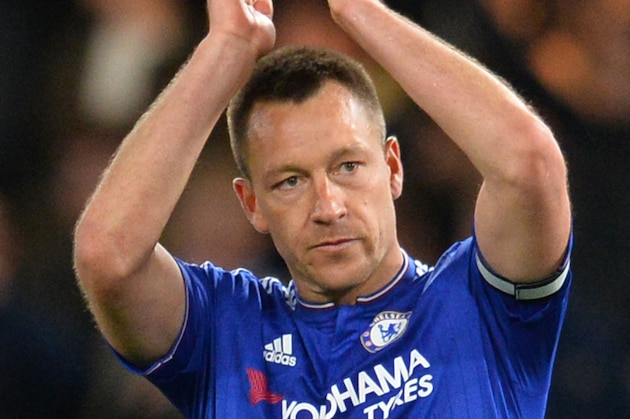 Chelsea's English defender John Terry applauds at the end of the English Premier League football match between Chelsea and Tottenham Hotspur at Stamford Bridge in London on May 2, 2016. / AFP / GLYN KIRK / RESTRICTED TO EDITORIAL USE. No use with unauthorized audio, video, data, fixture lists, club/league logos or 'live' services. Online in-match use limited to 75 images, no video emulation. No use in betting, games or single club/league/player publications.  /         (Photo credit should read GLYN KIRK/AFP/Getty Images)