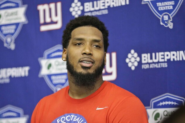 New York Giants' Larry Donnell responds to questions after an NFL football minicamp practice Tuesday, April 26, 2016, in East Rutherford, N.J. (AP Photo/Frank Franklin II)