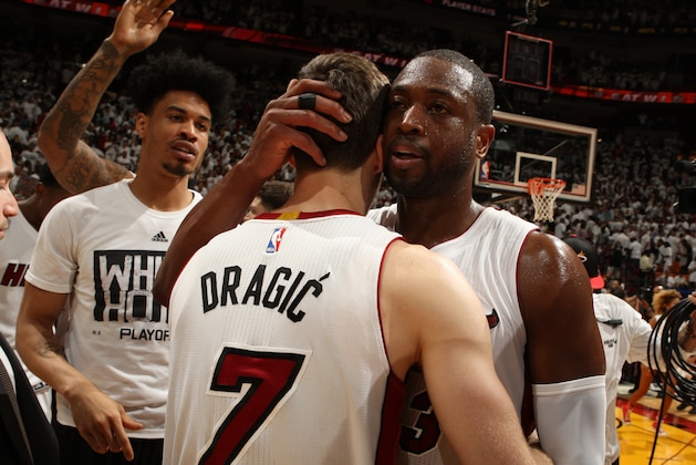 MIAMI, FL - MAY 13:  Goran Dragic #7 and Dwyane Wade #3 of the Miami Heat celebrate after Game Six of the Eastern Conference Semifinals against the Toronto Raptors during the 2016 NBA Playoffs on May 13, 2016 at AmericanAirlines Arena in Miami, Florida. NOTE TO USER: User expressly acknowledges and agrees that, by downloading and or using this Photograph, user is consenting to the terms and conditions of the Getty Images License Agreement. Mandatory Copyright Notice: Copyright 2016 NBAE (Photo by Issac Baldizon/NBAE via Getty Images)