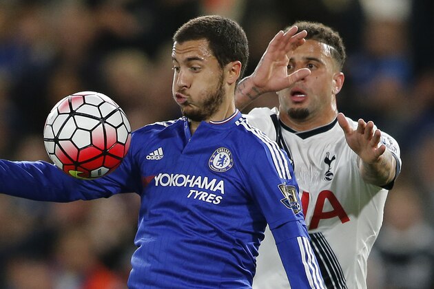 Chelsea's Eden Hazard, left, vies for the ball with Tottenham's Kyle Walker during the English Premier League soccer match between Chelsea and Tottenham Hotspur at Stamford Bridge stadium in London, Monday, May 2, 2016. (AP Photo/Frank Augstein)