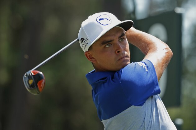 Rickie Fowler hits from the sixth tee during the second round of The Players Championship golf tournament Friday, May 13, 2016, in Ponte Vedra Beach, Fla. (AP Photo/Lynne Sladky)