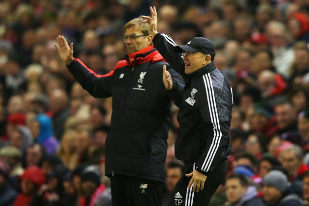 LIVERPOOL, ENGLAND - DECEMBER 13: Tony Pulis manager of West Bromwich Albion and Jurgen Klopp, manager of Liverpool react during the Barclays Premier League match between Liverpool and West Bromwich Albion at Anfield on December 13, 2015 in Liverpool, England. (Photo by Alex Livesey/Getty Images) LIVERPOOL, ENGLAND - DECEMBER 13: Tony Pulis manager of West Bromwich Albion and Jurgen Klopp, manager of Liverpool react during the Barclays Premier League match between Liverpool and West Bromwich Albion at Anfield on December 13, 2015 in Liverpool, England. (Photo by Alex Livesey/Getty Images)