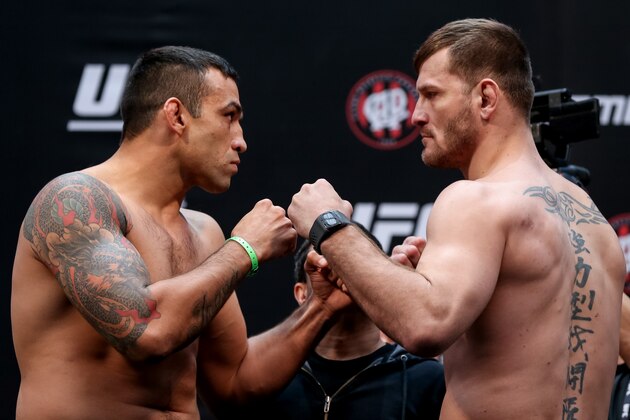CURITIBA, BRAZIL - MAY 13:  (L-R) Opponents Fabricio Werdum of Brazil and Stipe Miocic of the United States face off during the UFC 198 weigh-in at Arena da Baixada stadium on May 13, 2016 in Curitiba, Brazil. (Photo by Buda Mendes/Getty Images)