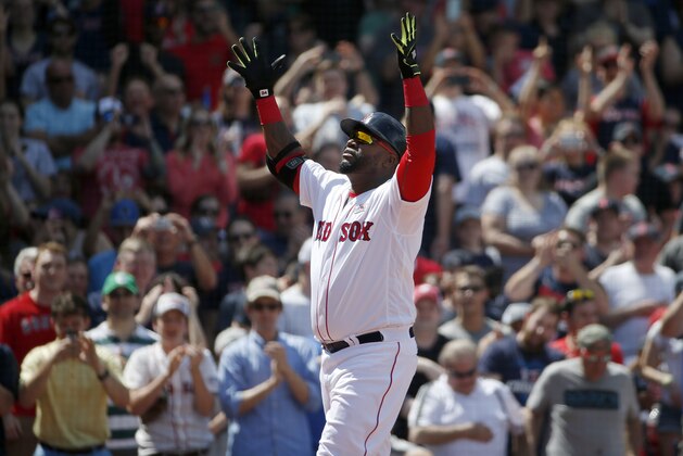 Boston Red Sox's David Ortiz celebrates his solo home run during the third inning of a baseball game against the Houston Astros in Boston, Saturday, May 14, 2016. (AP Photo/Michael Dwyer)