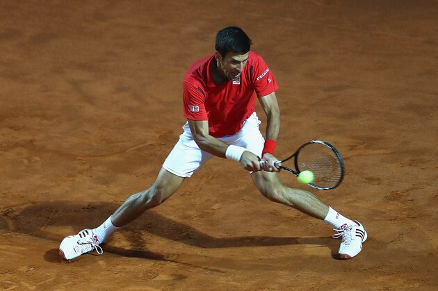 ROME, ITALY - MAY 14:  Novak Djokovic of Serbia in action against Kei Nishikori of Japan during day seven of The Internazionali BNL d'Italia 2016 on May 14, 2016 in Rome, Italy.  (Photo by Matthew Lewis/Getty Images)