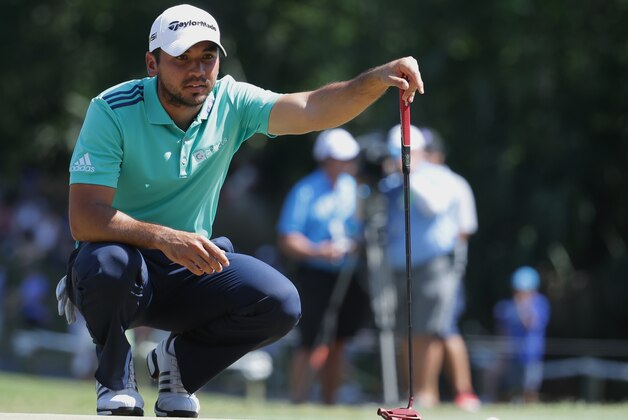 Jason Day of Australia, looks at his shot on the sixth green during the third round of The Players Championship golf tournament Saturday, May 14, 2016, in Ponte Vedra Beach, Fla. Day made a double bogey on the hole. (AP Photo/Lynne Sladky)