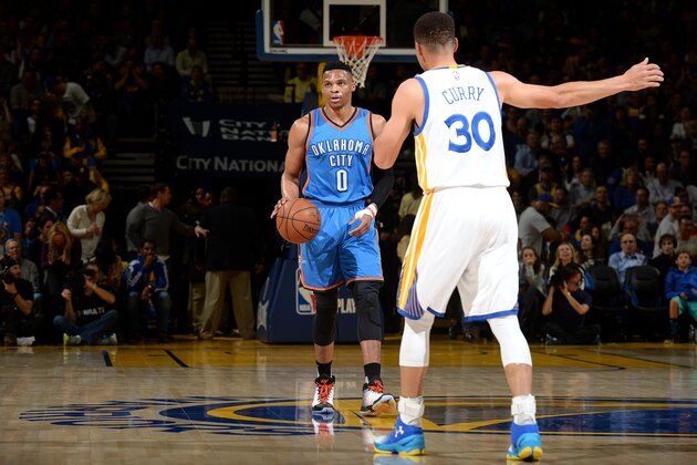 OAKLAND, CA - MARCH 3: Russell Westbrook #0 of the Oklahoma City Thunder handles the ball during the game against Stephen Curry #30 of the Golden State Warriors on March 3, 2016 at ORACLE Arena in Oakland, California. NOTE TO USER: User expressly acknowledges and agrees that, by downloading and or using this photograph, user is consenting to the terms and conditions of Getty Images License Agreement. Mandatory Copyright Notice: Copyright 2016 NBAE (Photo by Garrett Ellwood/NBAE via Getty Images)