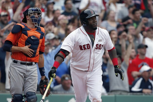 Boston Red Sox's David Ortiz, right, watches his game-winning double in front of Houston Astros' Jason Castro during the 11th inning of a baseball game in Boston, Saturday, May 14, 2016. The Red Sox won 6-5. (AP Photo/Michael Dwyer)