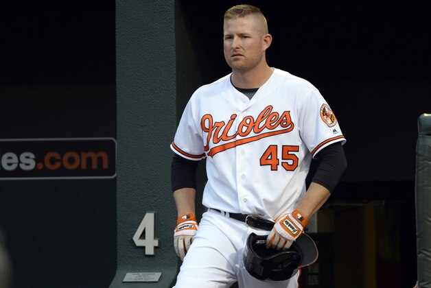 May 3, 2016; Baltimore, MD, USA; Baltimore Orioles right fielder Mark Trumbo (45) stands in the dugout during the first inning against the New York Yankees at Oriole Park at Camden Yards. Mandatory Credit: Tommy Gilligan-USA TODAY Sports