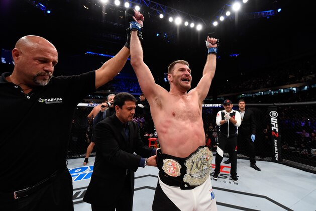 CURITIBA, BRAZIL - MAY 14:  Stipe Miocic celebrates after defeating Fabricio Werdum of Brazil by KO in their UFC heavyweight championship bout during the UFC 198 event at Arena da Baixada stadium on May 14, 2016 in Curitiba, Parana, Brazil.  (Photo by Josh Hedges/Zuffa LLC/Zuffa LLC via Getty Images)
