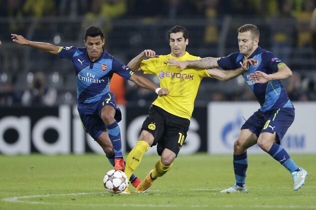 (L-R) Alexis Sanchez of Arsenal FC, Henrikh Mkhitaryan of Borussia Dortmund, Jack Wilshere of Arsenal FC during the UEFA Champions League group D match between Borussia Dortmund and Arsenal on September 16, 2014 at the Signal Iduna Park stadium in Dortmund, Germany.(Photo by VI Images via Getty Images)