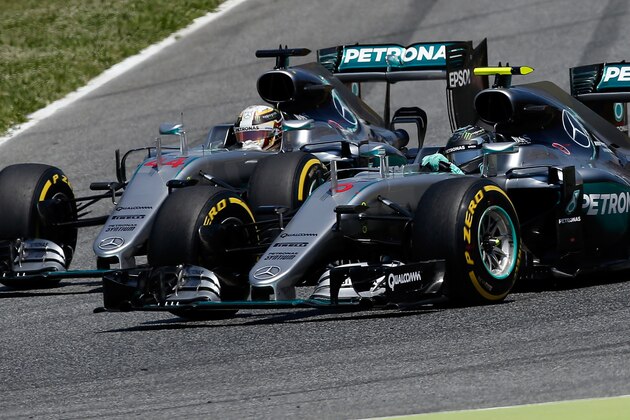Mercedes drivers Lewis Hamilton of Britain, left, and Nico Rosberg of Germany enter the first curve during the Spanish Formula One Grand Prix at the Barcelona Catalunya racetrack in Montmelo, just outside Barcelona, Spain, Sunday, May 15, 2016. (AP Photo/Manu Fernandez)