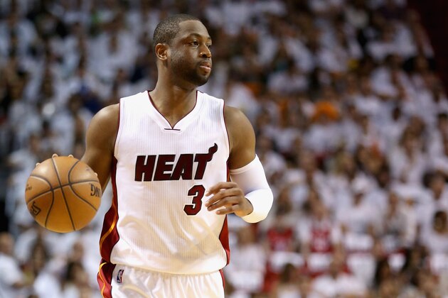 MIAMI, FL - MAY 13:  Dwyane Wade #3 of the Miami Heat brings the ball up the court against the Toronto Raptors during Game 6 of the Eastern Conference Semifinals of the 2016 NBA Playoffs at American Airlines Arena on May 13, 2016 in Miami, Florida. NOTE TO USER: User expressly acknowledges and agrees that, by downloading and or using this photograph, User is consenting to the terms and conditions of the Getty Images License Agreement.  (Photo by Streeter Lecka/Getty Images)