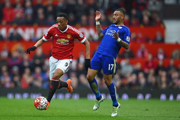 MANCHESTER, UNITED KINGDOM - MAY 01: Anthony Martial of Manchester United is closed down by Danny Simpson of Leicester City during the Barclays Premier League match between Manchester United and Leicester City at Old Trafford on May 1, 2016 in Manchester, England.  (Photo by Laurence Griffiths/Getty Images)