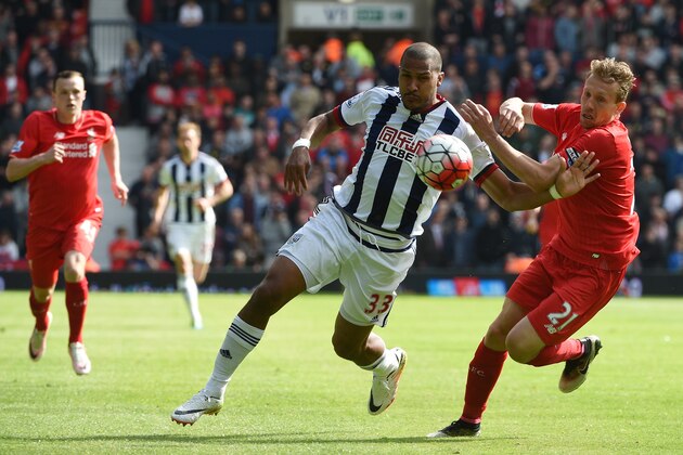 WEST BROMWICH, ENGLAND - MAY 15: Salomon Rondon of West Bromwich Albion and Lucas Leiva of Liverpool compete for the ball during the Barclays Premier League match between West Bromwich Albion and Liverpool at The Hawthorns on May 15, 2016 in West Bromwich, England.