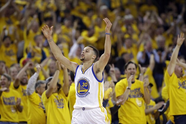 Golden State Warriors' Stephen Curry (30) celebrates after scoring against the Portland Trail Blazers during the first half in Game 5 of a second-round NBA basketball playoff series Wednesday, May 11, 2016, in Oakland, Calif. (AP Photo/Marcio Jose Sanchez)