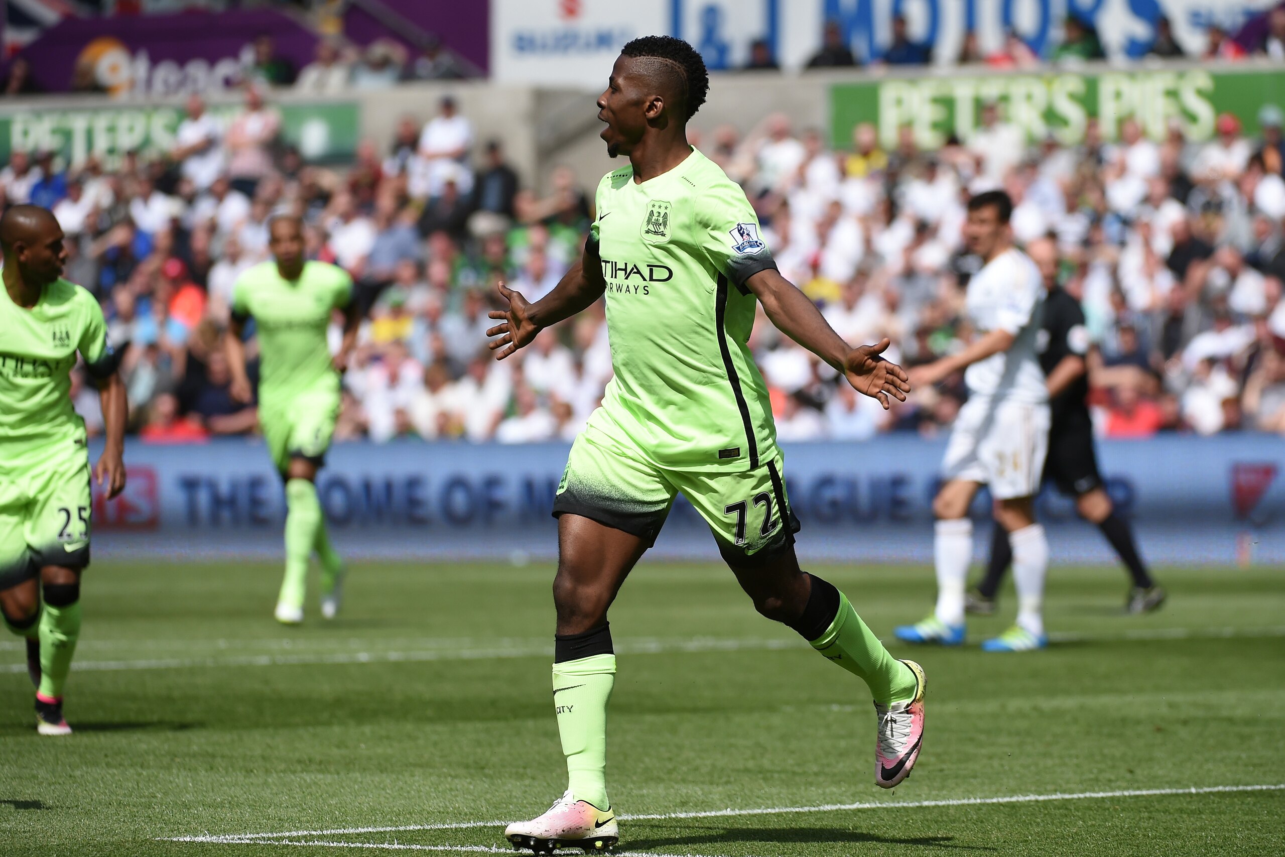 SWANSEA, WALES - MAY 15: Kelechi Iheanacho of Manchester City celebrates scoring his team's first goal during the Barclays Premier League match between Swansea City and Manchester City at the Liberty Stadium on May 15, 2016 in Swansea, Wales. (Photo by Tom Dulat/Getty Images) SWANSEA, WALES - MAY 15: Kelechi Iheanacho of Manchester City celebrates scoring his team's first goal during the Barclays Premier League match between Swansea City and Manchester City at the Liberty Stadium on May 15, 2016 in Swansea, Wales. (Photo by Tom Dulat/Getty Images)