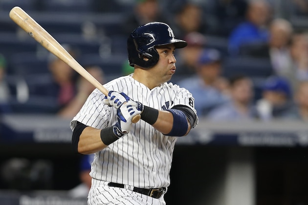 New York Yankees Carlos Beltran reacts as he watches his third-inning, solo, home run off Kansas City Royals starting pitcher Chris Young in a baseball game at Yankee Stadium in New York, Monday, May 9, 2016. (AP Photo/Kathy Willens)