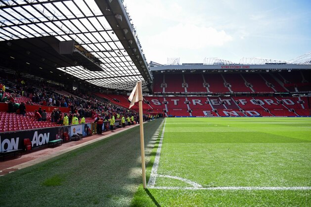 Fans evacuate Old Trafford stadium in Manchester, north west England, on May 15, 2016, after the English Premier League football match between Manchester United and Bournemouth was abandoned.
Police ordered Manchester United to abandon their final Premier League game of the season against Bournemouth on Sunday after a suspicious package was discovered at Old Trafford. / AFP / OLI SCARFF / RESTRICTED TO EDITORIAL USE. No use with unauthorized audio, video, data, fixture lists, club/league logos or 'live' services. Online in-match use limited to 75 images, no video emulation. No use in betting, games or single club/league/player publications.  /         (Photo credit should read OLI SCARFF/AFP/Getty Images)
