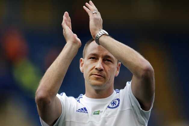 Chelsea's John Terry applauds to supporters after the English Premier League soccer match between Chelsea and Leicester City at Stamford Bridge stadium in London, Sunday, May 15, 2016. (AP Photo/Frank Augstein)