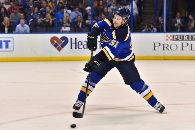 May 5, 2016; St. Louis, MO, USA; St. Louis Blues right wing Vladimir Tarasenko (91) clears the puck out of the zone against the Dallas Stars during the first period in game four of the second round of the 2016 Stanley Cup Playoffs at Scottrade Center. Mandatory Credit: Jasen Vinlove-USA TODAY Sports