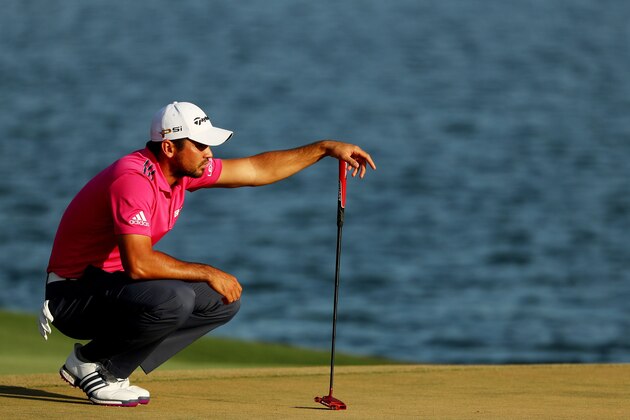 PONTE VEDRA BEACH, FL - MAY 15:  Jason Day of Australia lines up a putt on the 18th green during the final round of THE PLAYERS Championship at the Stadium course at TPC Sawgrass on May 15, 2016 in Ponte Vedra Beach, Florida.  (Photo by Mike Ehrmann/Getty Images)