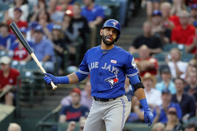 Toronto Blue Jays' Jose Bautista strikes out against Texas Rangers' Colby Lewis in the first inning of a baseball game, Saturday, May 14, 2016, in Arlington, Texas. (AP Photo/Tony Gutierrez)