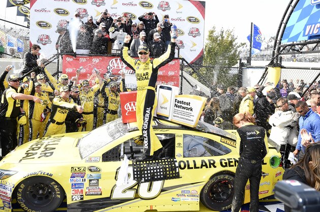 Matt Kenseth celebrates in Victory Lane after he won the NASCAR Sprint Cup series auto race, Sunday, May 15, 2016, at Dover International Speedway in Dover, Del. (AP Photo/Nick Wass)