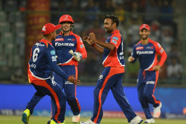 Delhi Daredevils bowler Amit Mishra (R) celebrates after he dismissed Kings XI Punjab batsman Manan Vohra during the 2016 Indian Premier League (IPL) Twenty20 cricket match between Delhi Daredevils and Kings XI Punjab at The Feroz Shah Kotla Cricket Stadium in New Delhi on April 15, 2016. ------IMAGE RESTRICTED TO EDITORIAL USE - STRICTLY NO COMMERCIAL USE- / AFP / SAJJAD HUSSAIN        (Photo credit should read SAJJAD HUSSAIN/AFP/Getty Images)