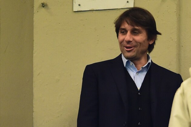 Italian national team head coach Antonio Conte attends the Italian Serie A football match AC Milan' vs Carpi  at San Siro Stadium in Milan on April 21, 2016.  / AFP / GIUSEPPE CACACE        (Photo credit should read GIUSEPPE CACACE/AFP/Getty Images)