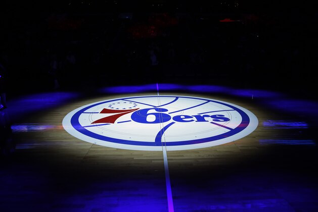 The Philadelphia 76ers' lhalf-court logo is shown before an NBA basketball game against the Cleveland Cavaliers, Friday, Nov. 8, 2013, in Philadelphia. (AP Photo/Matt Slocum)