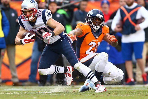 Jan 24, 2016; Denver, CO, USA; New England Patriots wide receiver Danny Amendola (80) tries to get past Denver Broncos cornerback Aqib Talib (21) in the second half in the AFC Championship football game at Sports Authority Field at Mile High. Mandatory Credit: Mark J. Rebilas-USA TODAY Sports