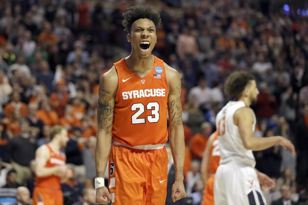 Syracuse's Malachi Richardson (23) reacts during the second half of a college basketball game against Virginia in the regional finals of the NCAA Tournament, Sunday, March 27, 2016, in Chicago. Syracuse won 68-62. (AP Photo/Nam Y. Huh)