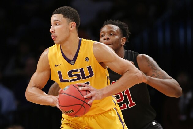 LSU forward Ben Simmons (25) looks to pass as North Carolina State forward BeeJay Anya (21) defends in the second half of an NCAA college basketball matchup in the Legends Classic consolation game, Tuesday, Nov. 24, 2015, in New York. (AP Photo/Kathy Willens)