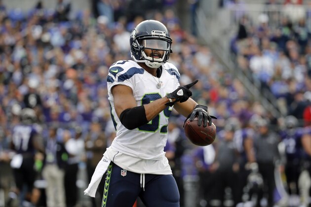 Seattle Seahawks wide receiver Doug Baldwin gestures after scoring a touchdown during an NFL football game against the Baltimore Ravens, Sunday, Dec. 13, 2015, in Baltimore. (AP Photo/Patrick Semansky)