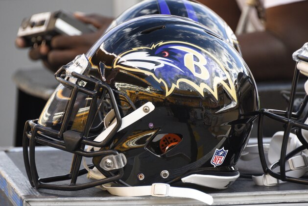 A pair of Baltimore Ravens helmets are on a bench on the sideline  before an NFL football game against the Pittsburgh Steelers Thursday, Oct. 1, 2015 in Pittsburgh. (AP Photo/Don Wright)