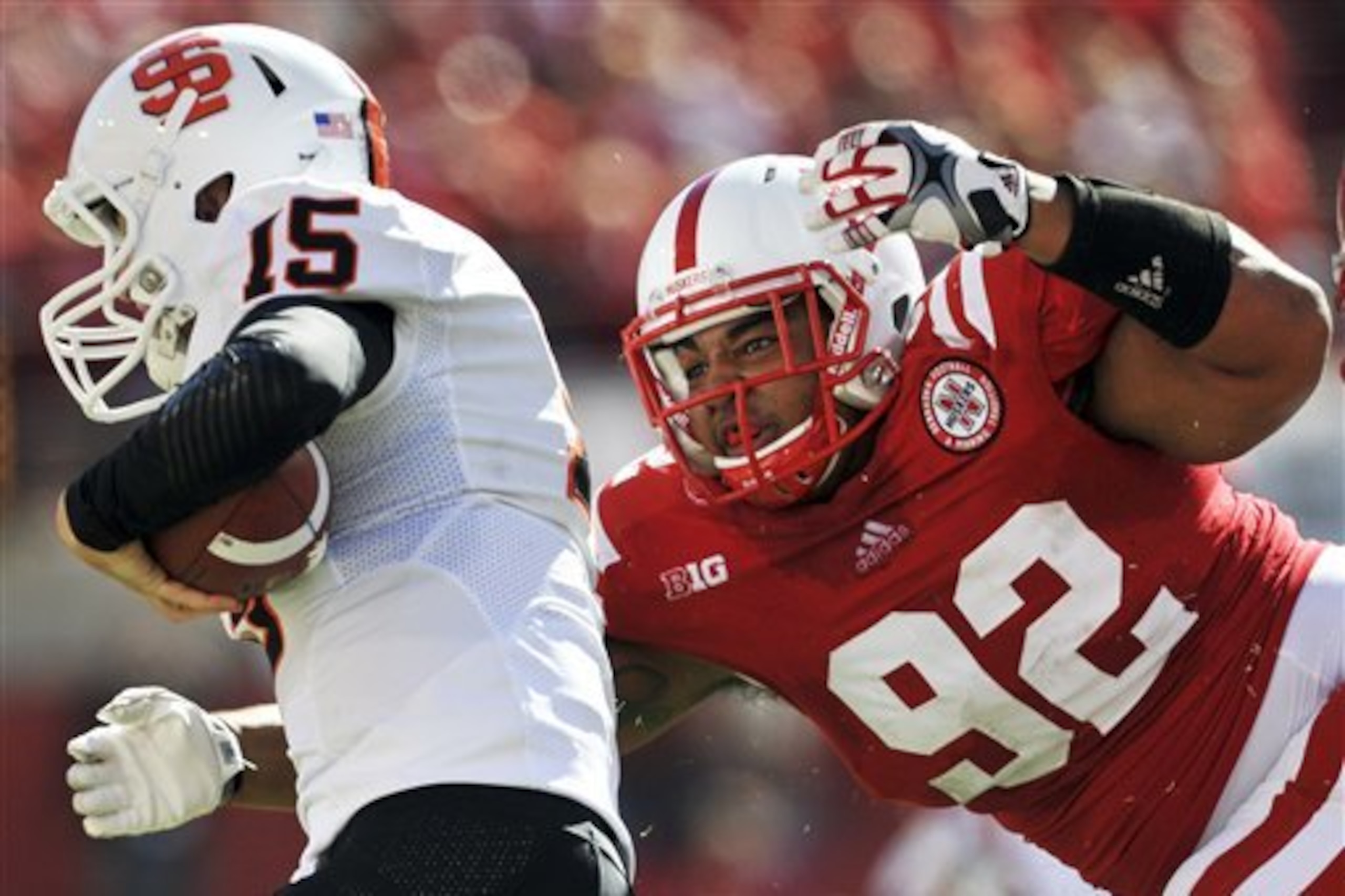 Nebraska's Kevin Williams (92) goes after Idaho State quarterback Kevin Yost in the first half of an NCAA college football game in Lincoln, Neb., Saturday, Sept. 22, 2012. (AP Photo/Dave Weaver)